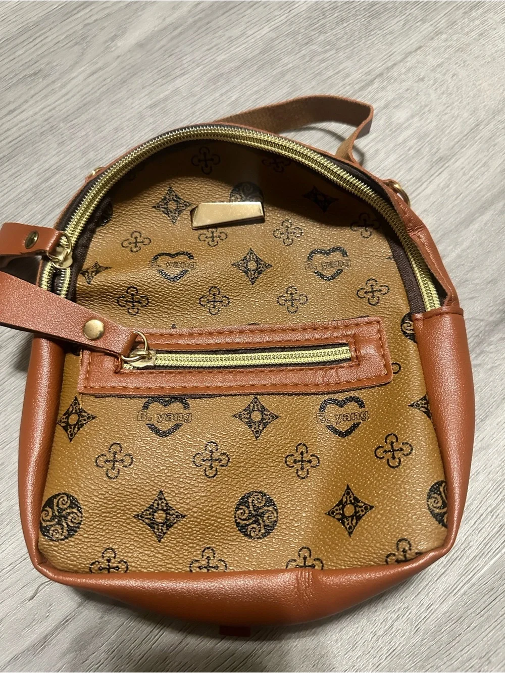 Women's Brown Monogram Crossbody Backpack - Stylish Tan Accent
